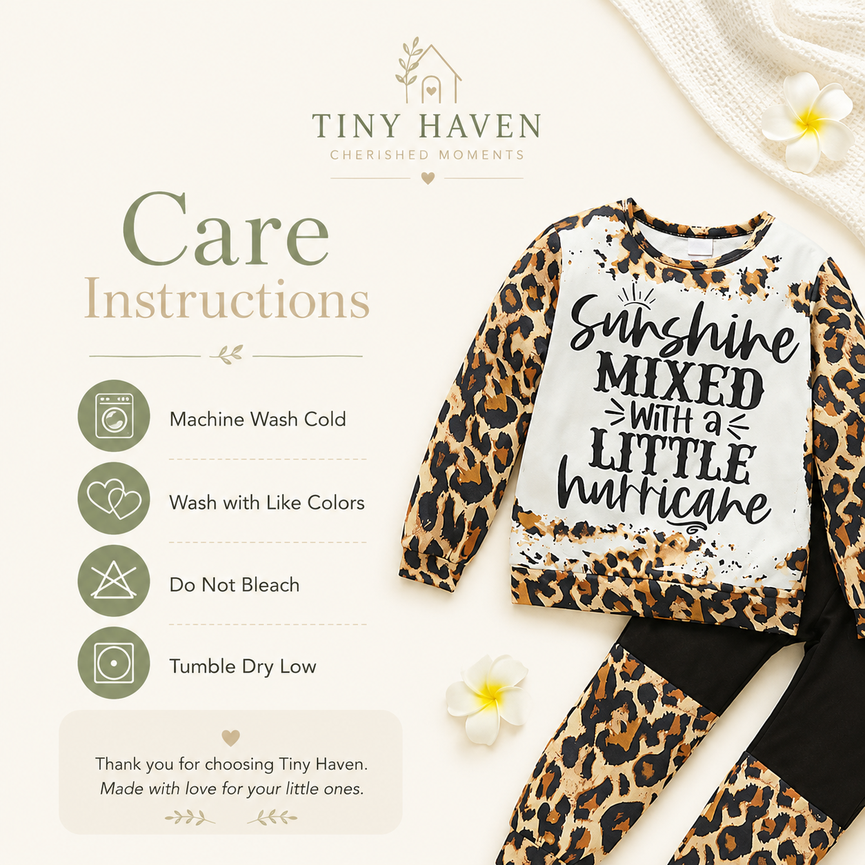 Care instructions for the toddler leopard sweatsuit including machine wash cold, wash with like colors, do not bleach, and tumble dry low.
